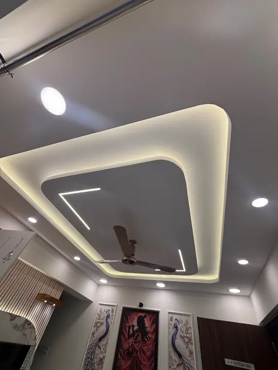Layered false ceiling with cove and profile lights – VS Interiors, Wagholi
