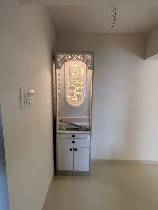 Backlit pooja unit with jaali arch top – VS Interiors, Wagholi