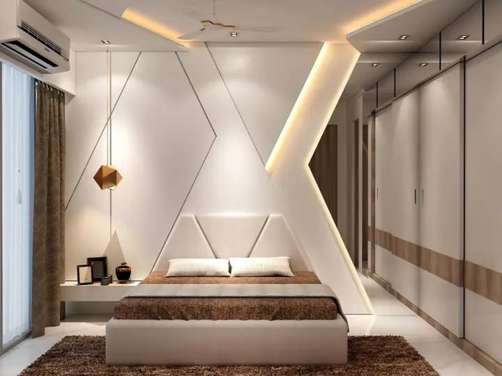 Bedroom with geometric wall design and cove lighting – VS Interiors, Wagholi