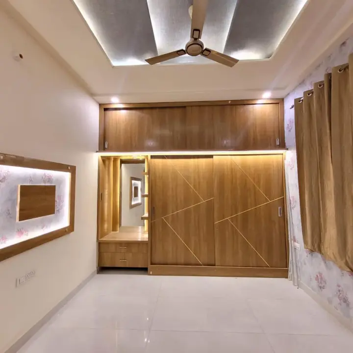Bedroom wardrobe with wooden false ceiling – VS Interiors, Wagholi
