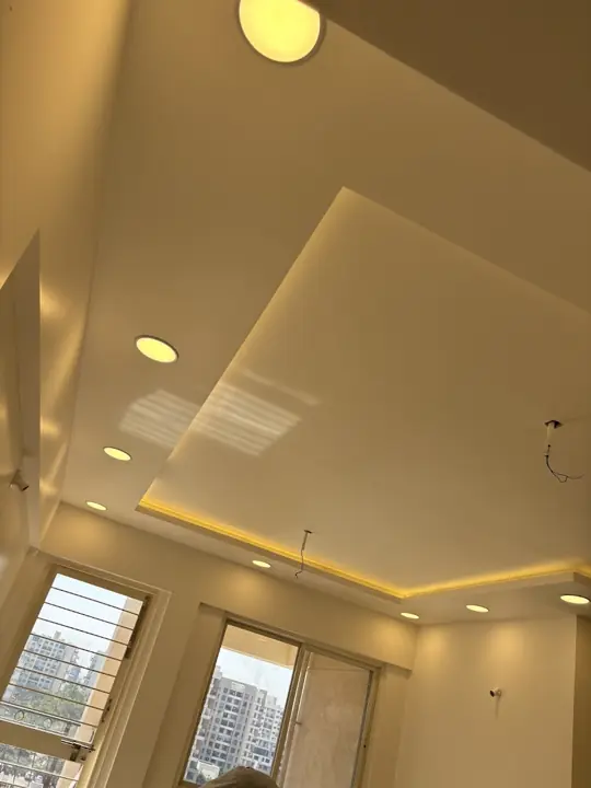 Cove-lit false ceiling in a bedroom – VS Interiors, Wagholi