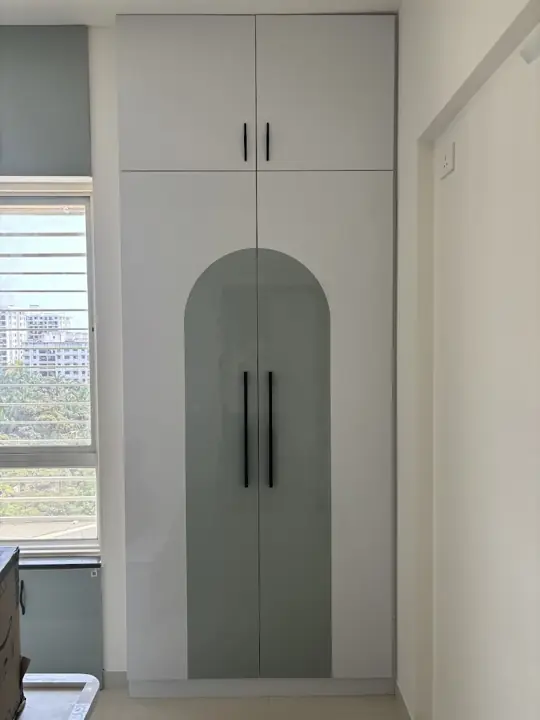 Wardrobe with arched grey shutter – VS Interiors, Wagholi