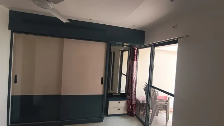 Two-tone sliding wardrobe – VS Interiors, Wagholi